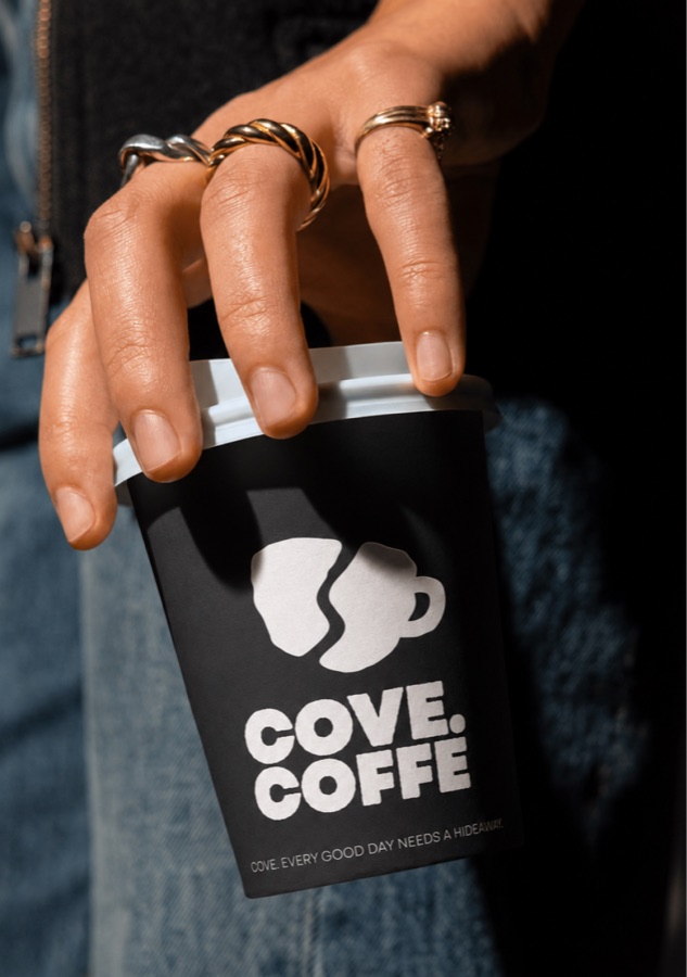 Cove Coffee branded cup, rebrand by psst.studio